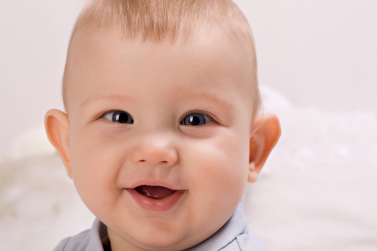 Smile baby boy looking at camera